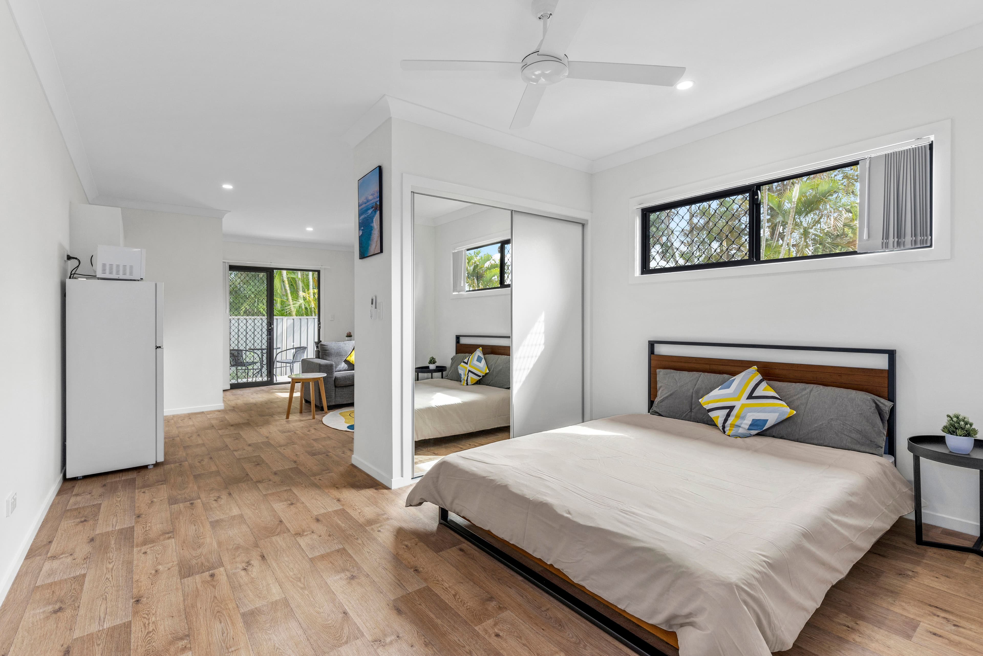 Modern studio interior with bedroom and living area